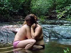 Hot lesbians kiss in the lake